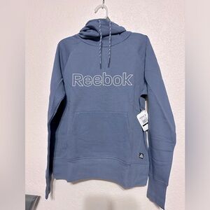 New Reebok Women Essential French Terry’s Hoodies with Pocket, Sizes L; XXL Blue